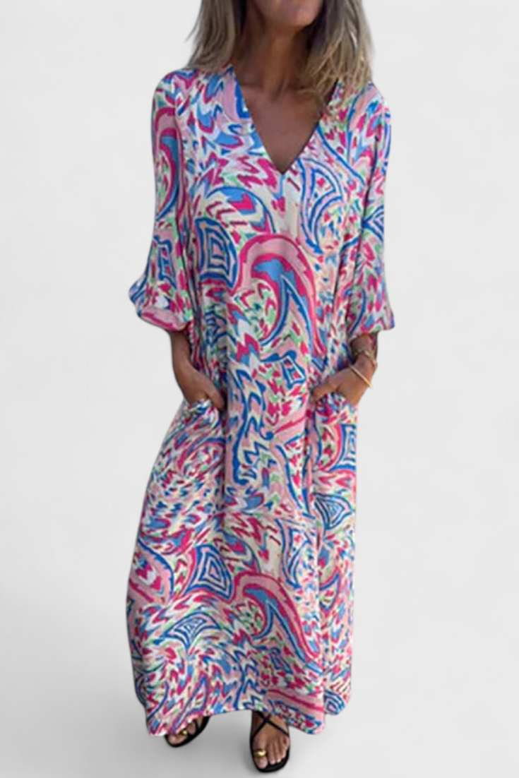 Carmina Bohemian Maxi Dress with V-Neckline and Abstract Design