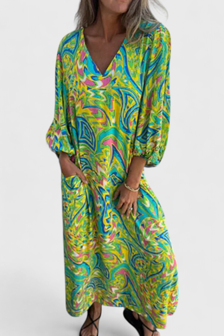 Carmina Bohemian Maxi Dress with V-Neckline and Abstract Design