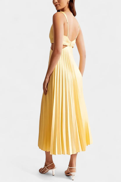 Selena's Sleeveless Pleated Dress with Side Slit and Twist Detail
