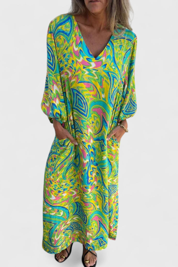 Carmina Bohemian Maxi Dress with V-Neckline and Abstract Design