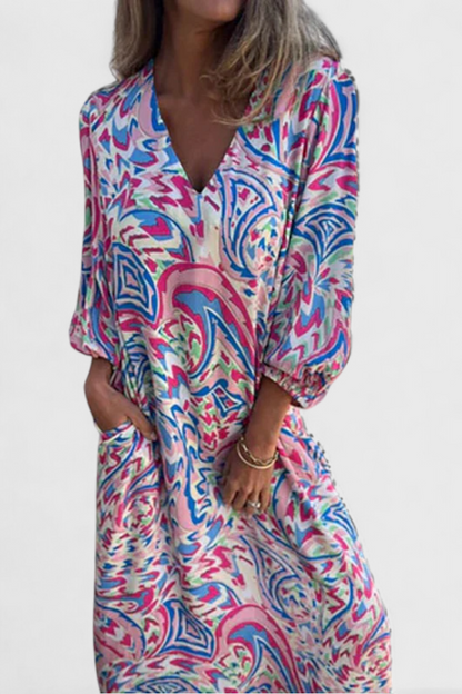 Carmina Bohemian Maxi Dress with V-Neckline and Abstract Design