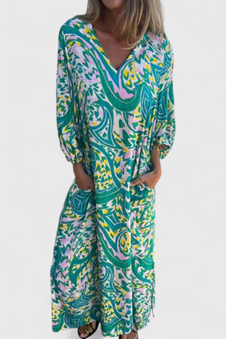 Carmina Bohemian Maxi Dress with V-Neckline and Abstract Design