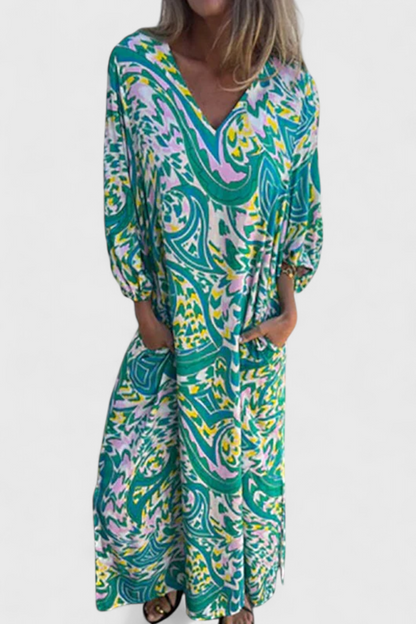 Carmina Bohemian Maxi Dress with V-Neckline and Abstract Design