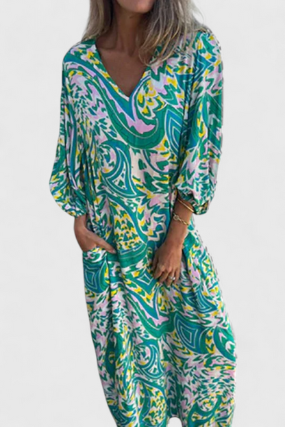 Carmina Bohemian Maxi Dress with V-Neckline and Abstract Design