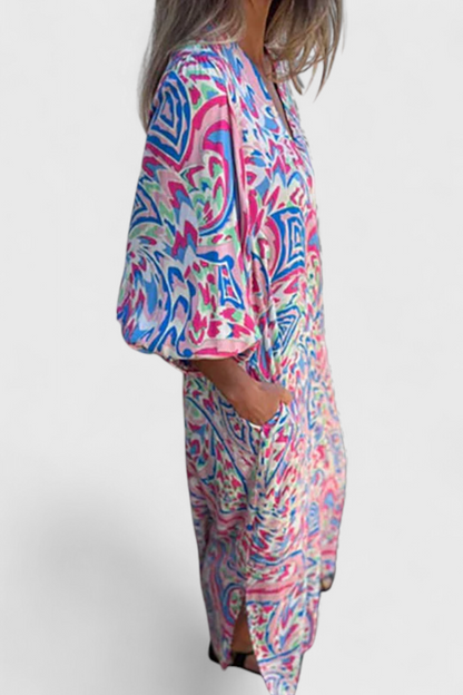 Carmina Bohemian Maxi Dress with V-Neckline and Abstract Design