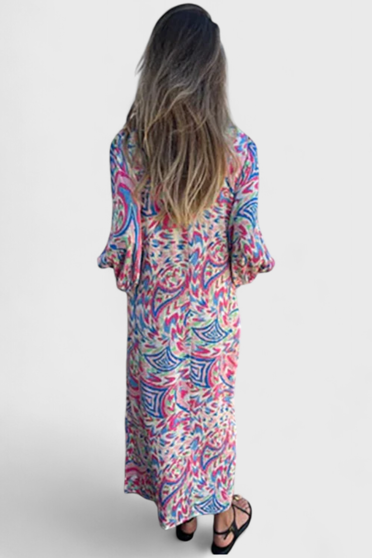 Carmina Bohemian Maxi Dress with V-Neckline and Abstract Design