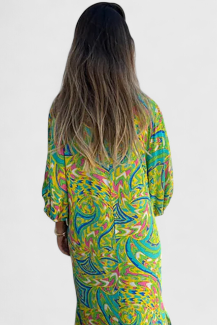 Carmina Bohemian Maxi Dress with V-Neckline and Abstract Design