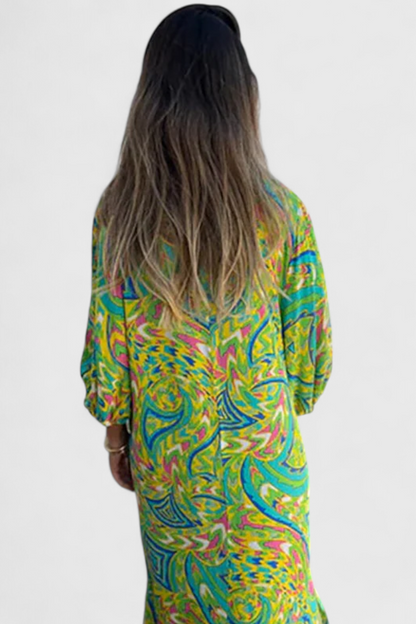 Carmina Bohemian Maxi Dress with V-Neckline and Abstract Design