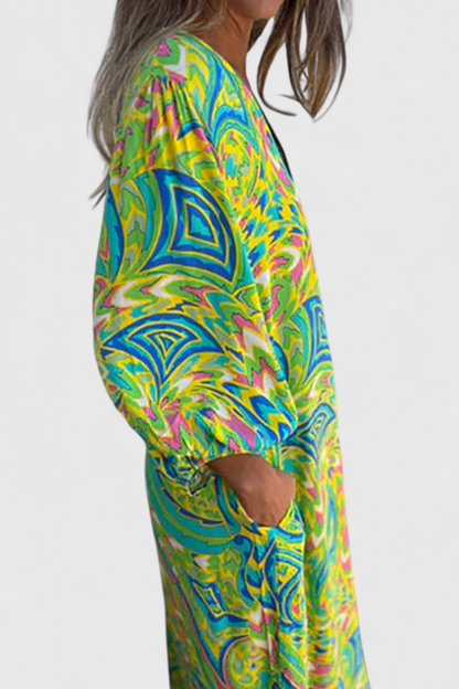 Carmina Bohemian Maxi Dress with V-Neckline and Abstract Design